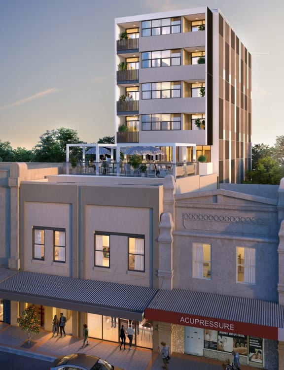 an artist impression of the apartment building at dusk
