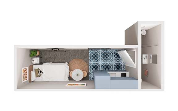 A white bedroom with a bed, pillow, and a plant.