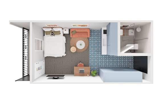 A small bedroom with a bed, desk, and chair.