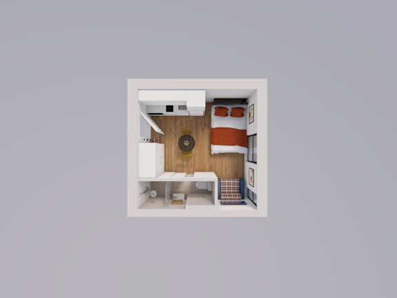 A small, white, square room with a wooden floor and a white ceiling.