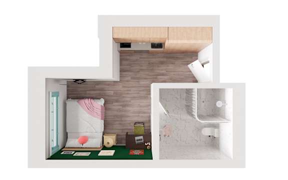 A white room with a bed, a nightstand, and a small table with a lamp on it.