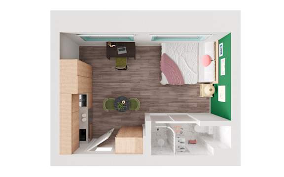 A small room with a bed, a desk, and a chair.