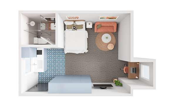 A modern kitchen with a blue mat on the floor.