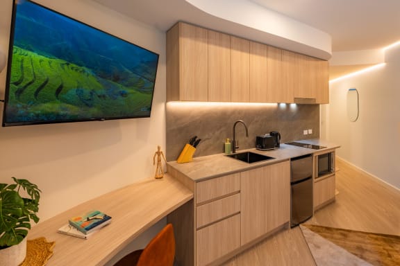 a kitchen with a sink and a counter top