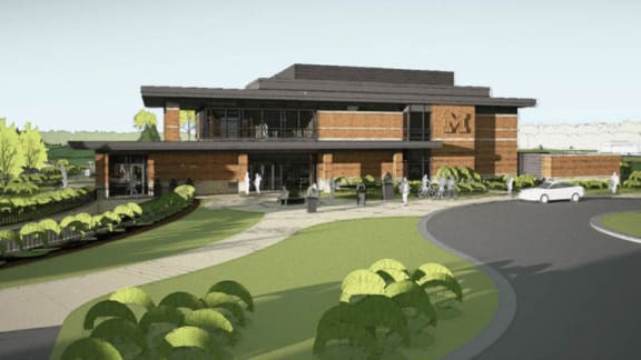 an artist's rendering of a building with a garden in front of it