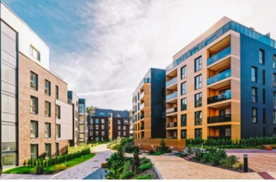 a rendering of a group of new apartment buildings