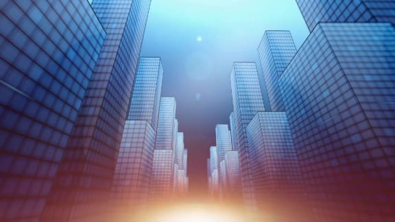a cityscape with the sun shining through skyscrapers