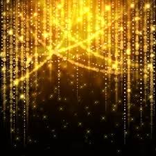 a starburst of gold lights on a black background