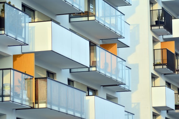 a close up of balconies on an apartment building