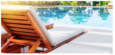 Alt-Deck chair along side the pool to enjoy the sun bath,