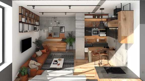 A modern living room with a kitchen area in the background.