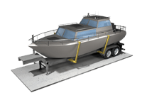 A boat is being transported on a trailer.