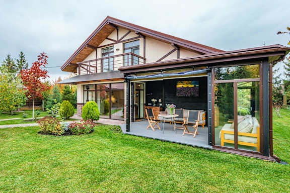 A house with a patio and a garden.