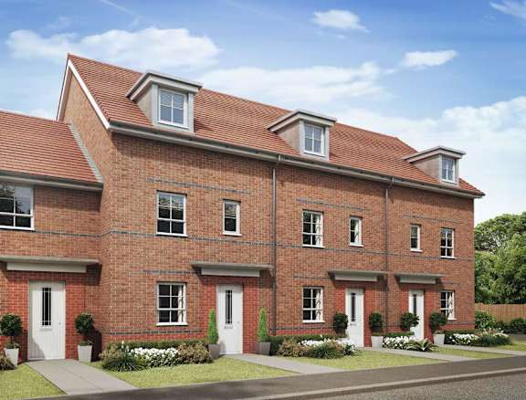 A red brick building with white doors and windows.
