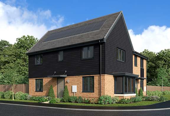 A modern house with a black roof and brick walls.