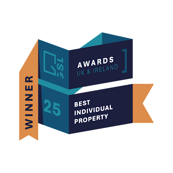 A graphic design shows a 3D box with the word "WINNER" on the left side and "BEST INDIVIDUAL PROPERTY" on the right side.