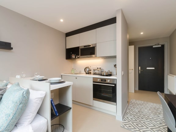 Floor Plan  a kitchen or kitchenette at avida condo near naia