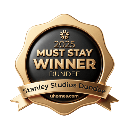 A golden badge with the text "2025 MUST STAY WINNER DUNDEE" and "Stanley Studios Dundee" on it.