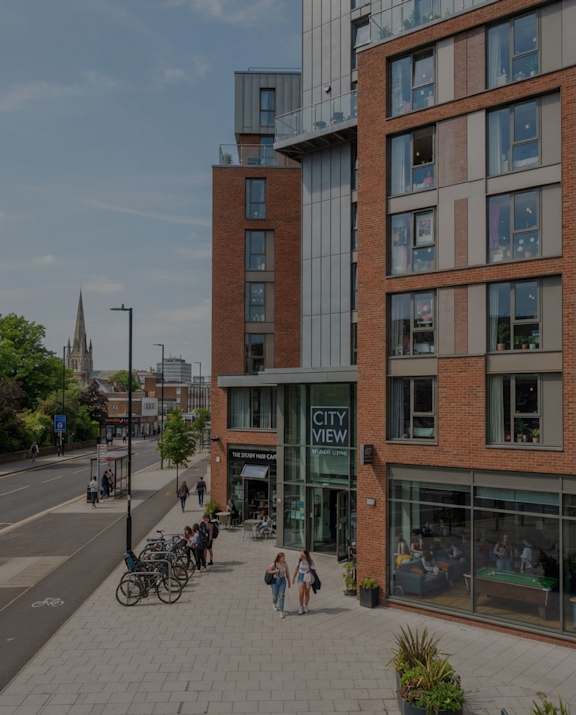 A street view of a city with a building named City View.