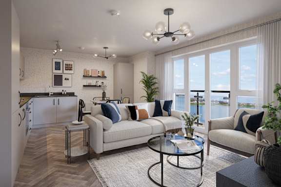 A modern living room with a large window overlooking the water.