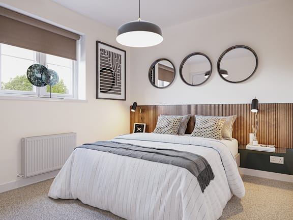 A bedroom with a large bed and a window with blinds.