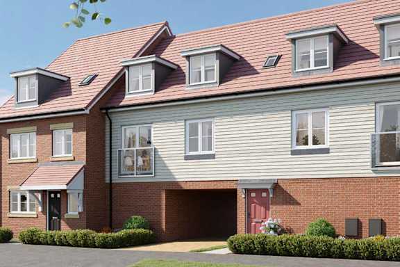A row of houses with a red roof and a grey facade.