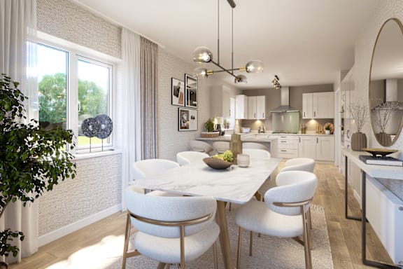 A modern dining room with a white table and chairs.