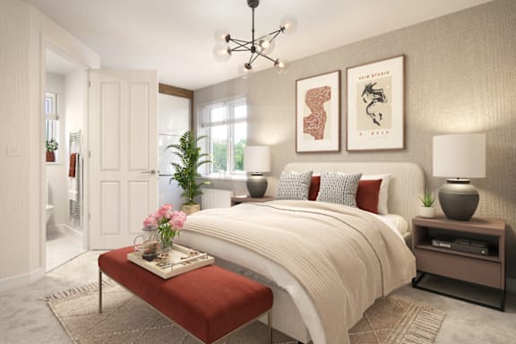 A bedroom with a large bed, a bench, and a potted plant.