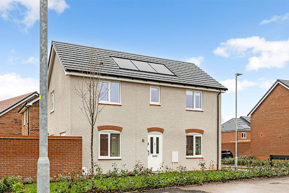 A house with solar panels on the roof.