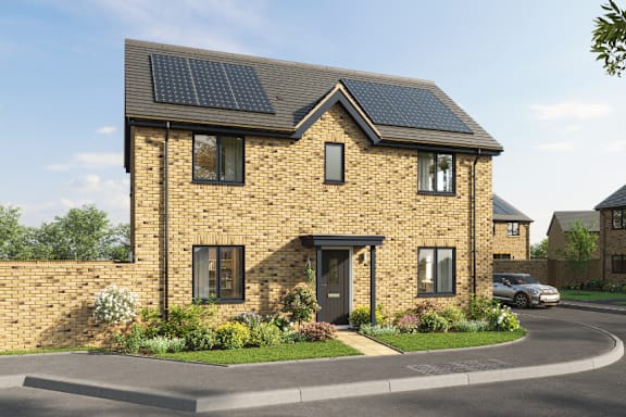 A house with solar panels on the roof is surrounded by a well-kept garden.