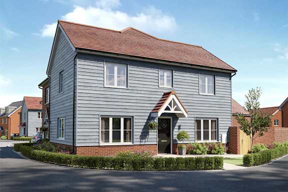 A grey house with a brown roof and a white window.