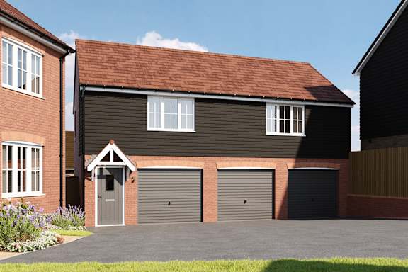 A house with a grey garage door and a grey door.