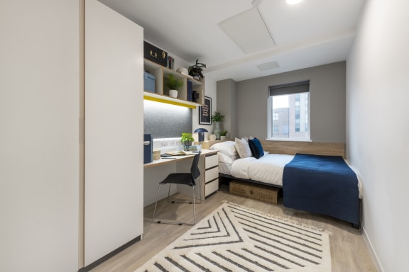 Floor Plan  standard ensuite with blue bedding