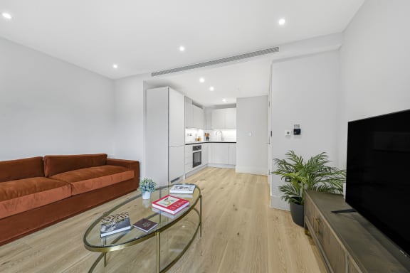 a living room with a couch and a table