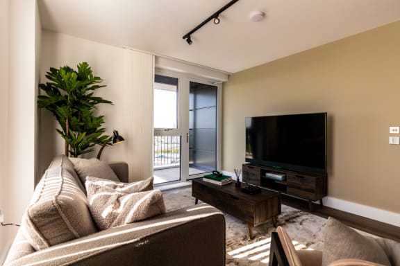 a living room with a couch and a tv