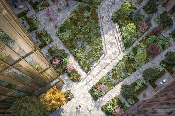 A green space surrounded by buildings.