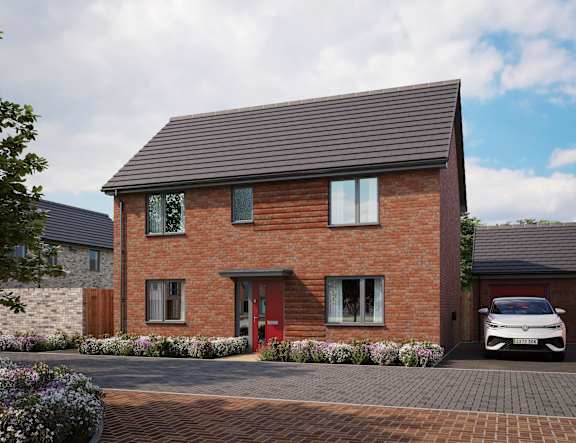 A red brick house with a white car parked in front at The Foundry Apartments, Bordon, GU35 9FE