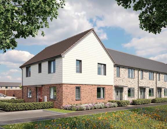 A modern house with a grey roof and a brick base is surrounded by a well-kept garden at The Foundry Apartments, Bordon