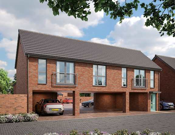 A modern brick house with a car parked in the driveway at The Foundry Apartments, Bordon