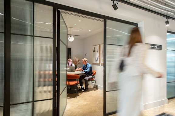 Glass wall separates two meeting rooms at The Lark, London, SW11 7EA