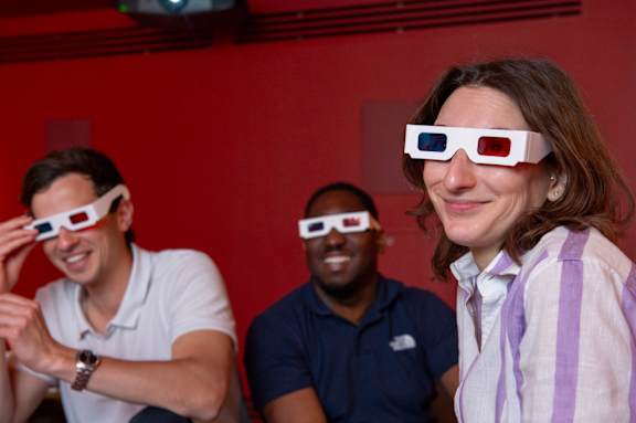 Group of people wearing 3D glasses at The Lark, London, SW11 7EA