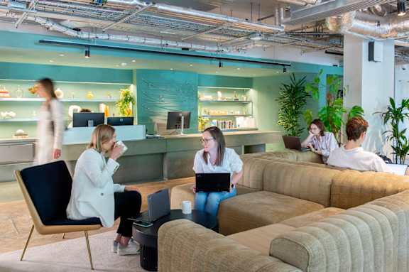 Group of people sitting in lobby area at The Lark, London, SW11 7EA