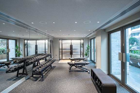 Gym with mirror at The Lark, London, SW11 7EA