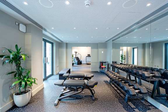 Gym with row of benches at The Lark, London