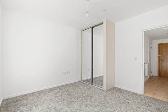 Bedroom With Closet at The Quarters Apartments, Dock Road