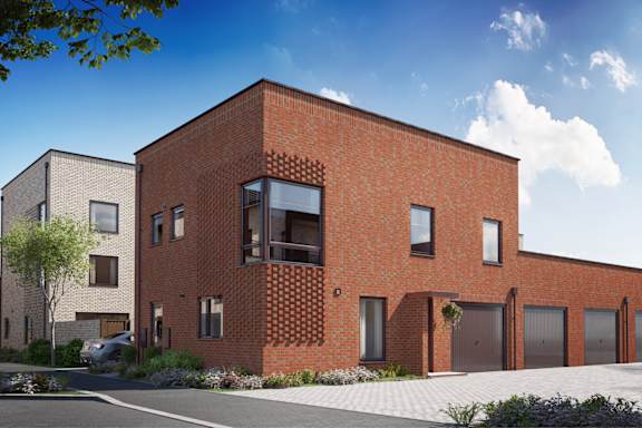 A modern brick house with a tree in front.