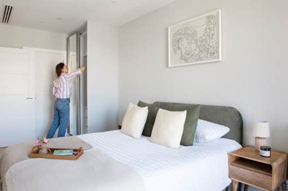 Bedroom with a bed and comforter at The Lark, London, SW11 7EA