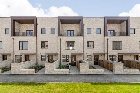 Floor Plan  A modern apartment building with a mix of brick and panel exterior walls at Origins Apartments, Cambridge, CB3 0UX