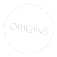 A black and white logo for Franklin Gardens Origins. at Origins Apartments, Cambridge, CB3 0UX