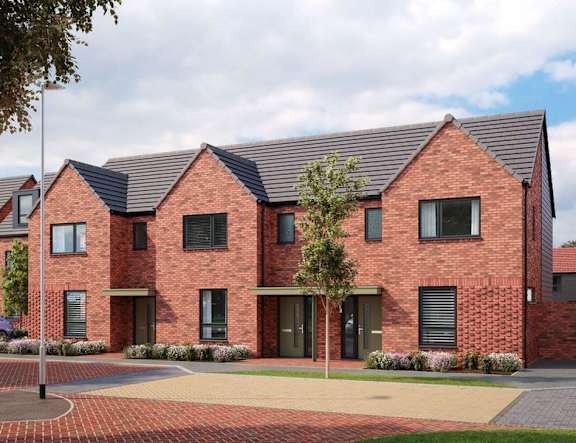 A red brick house with a black roof and a tree in front at The Woodlands Apartments, Milton Keynes, MK5 6GS
